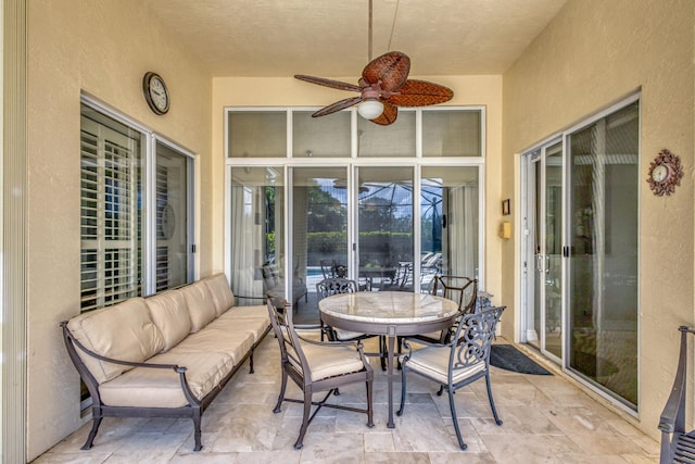 101 Sedona Way, Palm Beach Gardens, FL 33418 - sunroom / solarium featuring ceiling fan, outdoor dining area, and an outdoor living space