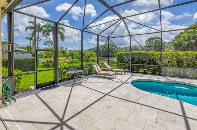 101 Sedona Way, Palm Beach Gardens, FL 33418 - swimming pool with a patio and glass enclosure