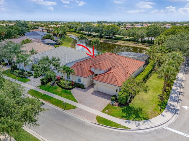 101 Sedona Way, Palm Beach Gardens, FL 33418 - view from above of property with a large body of water and a tree filled landscape