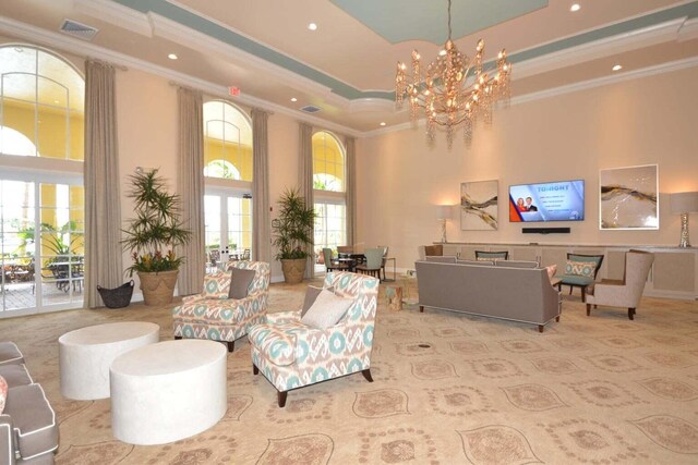 101 Sedona Way, Palm Beach Gardens, FL 33418 - building lobby with a towering ceiling, crown molding, and recessed lighting