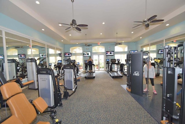 101 Sedona Way, Palm Beach Gardens, FL 33418 - gym with a ceiling fan, a raised ceiling, and recessed lighting