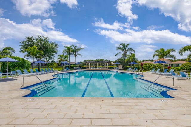 101 Sedona Way, Palm Beach Gardens, FL 33418 - community pool featuring a patio area