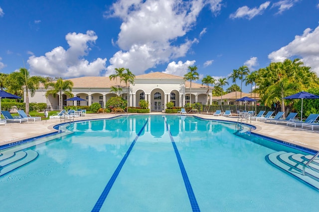 101 Sedona Way, Palm Beach Gardens, FL 33418 - community pool featuring a patio