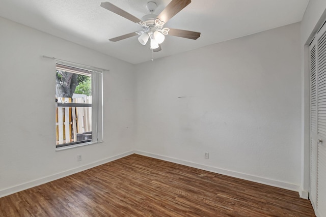 5171 Glencove Ln, West Palm Beach, FL 33415 - unfurnished bedroom with wood finished floors, a closet, baseboards, and ceiling fan