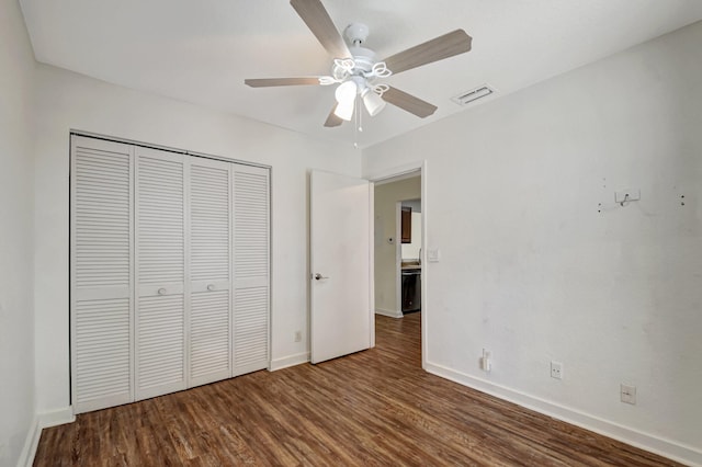 5171 Glencove Ln, West Palm Beach, FL 33415 - unfurnished bedroom featuring wood finished floors, baseboards, a closet, and a ceiling fan