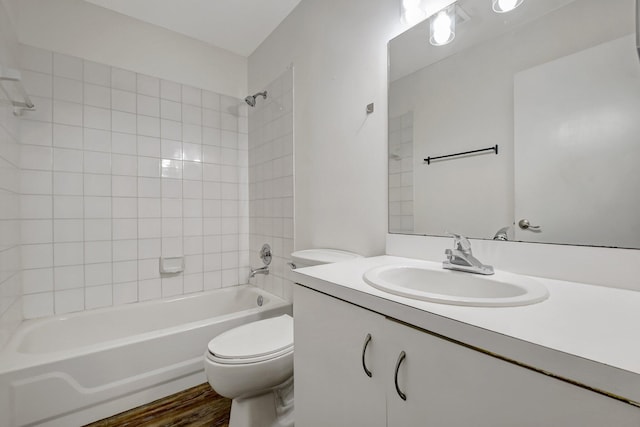 5171 Glencove Ln, West Palm Beach, FL 33415 - full bathroom featuring toilet, vanity, shower / washtub combination, and wood finished floors