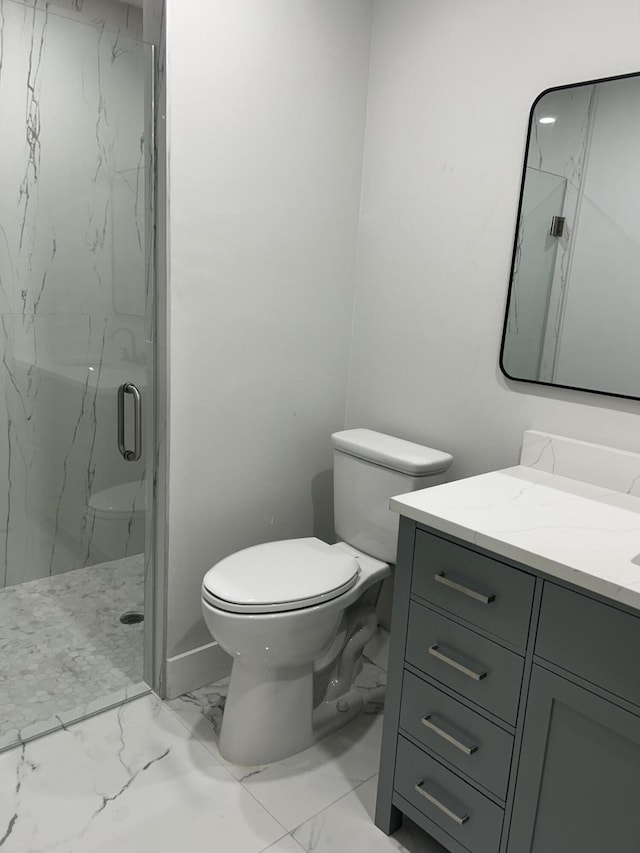 18228 48th Ave N, The Acreage, FL 33470 - bathroom featuring marble look tiles, vanity, a marble finish shower, and toilet