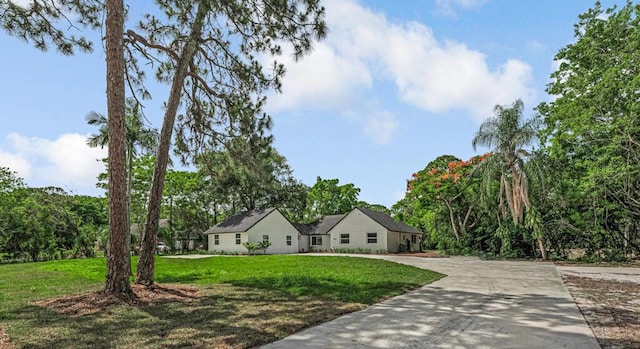 18228 48th Ave N, The Acreage, FL 33470 - ranch-style home with a front lawn