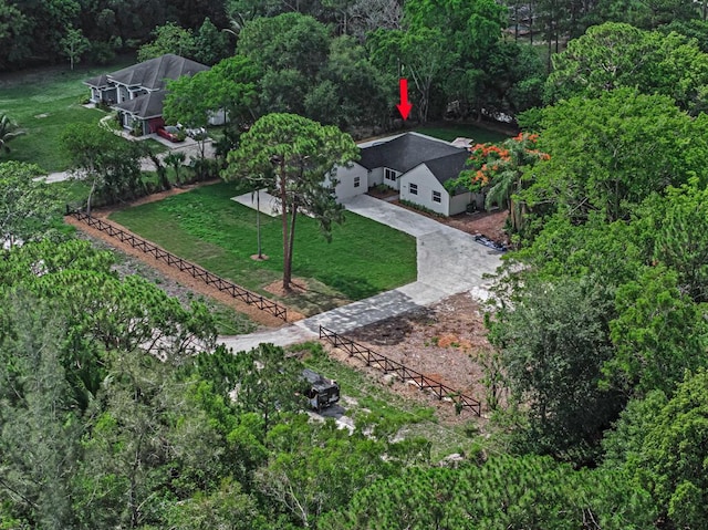 18228 48th Ave N, The Acreage, FL 33470 - aerial view of property and surrounding area featuring a heavily wooded area
