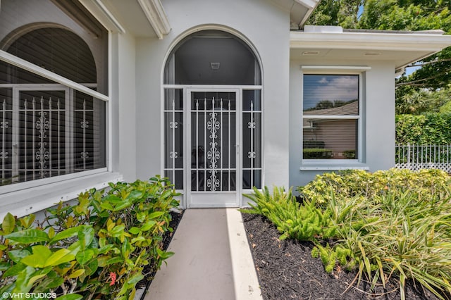 5096 SE Sweetbrier Ter, Hobe Sound, FL 33455 - entrance to property with stucco siding