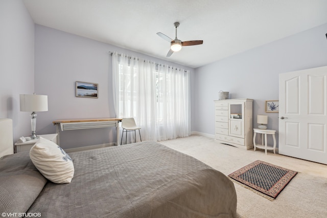 5096 SE Sweetbrier Ter, Hobe Sound, FL 33455 - carpeted bedroom with baseboards and a ceiling fan