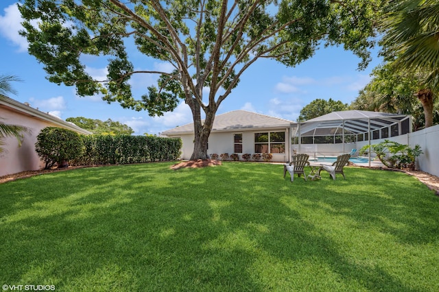 5096 SE Sweetbrier Ter, Hobe Sound, FL 33455 - view of yard with glass enclosure