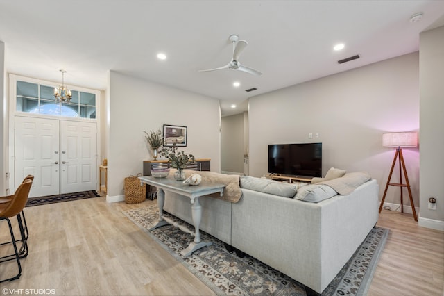 5096 SE Sweetbrier Ter, Hobe Sound, FL 33455 - living area featuring a chandelier, light wood-style flooring, baseboards, ceiling fan, and recessed lighting