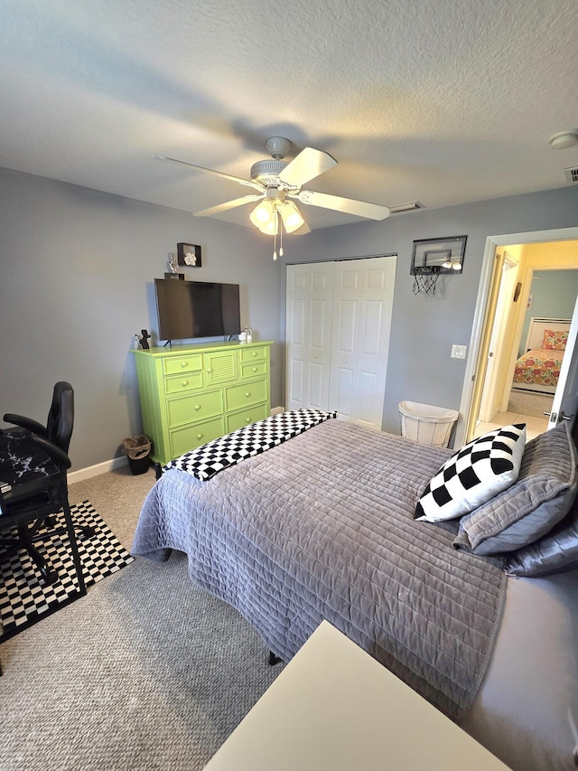 5237 NW Milner Dr, Port Saint Lucie, FL 34983 - bedroom featuring carpet flooring, a closet, ceiling fan, and baseboards