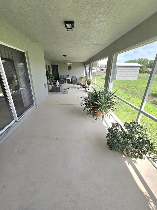 5237 NW Milner Dr, Port Saint Lucie, FL 34983 - sunroom / solarium featuring an outdoor hangout area and plenty of natural light