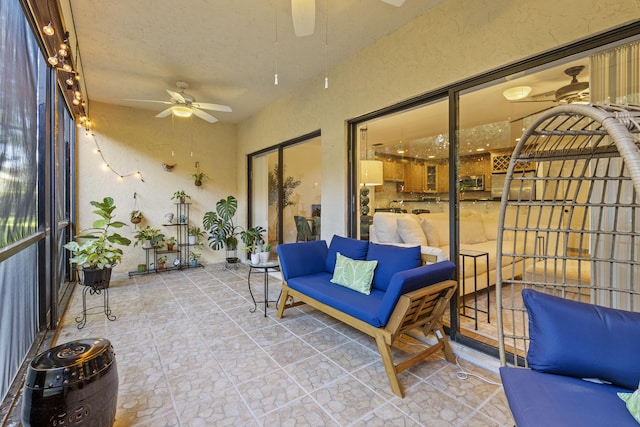 23 Lexington Ln W Unit A, Palm Beach Gardens, FL 33418 - sunroom / solarium featuring a ceiling fan and outdoor lounge area