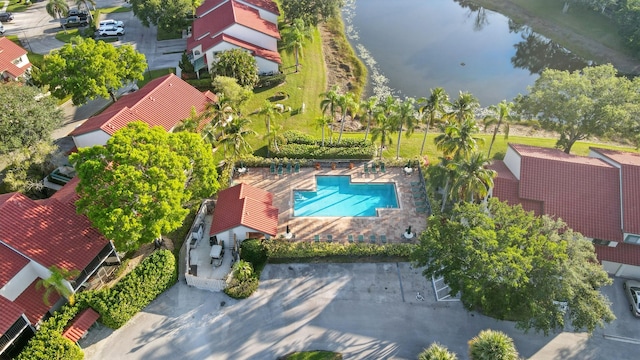 23 Lexington Ln W Unit A, Palm Beach Gardens, FL 33418 - drone / aerial view of a pool area and a nearby body of water