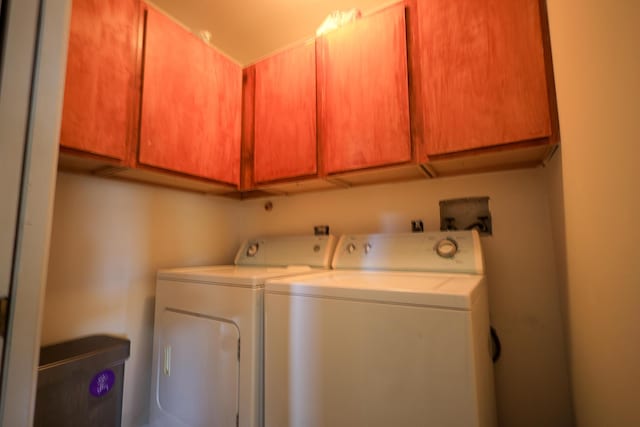 1356 N Climbing Rose, West Palm Beach, FL 33415 - washroom featuring cabinet space and washing machine and clothes dryer