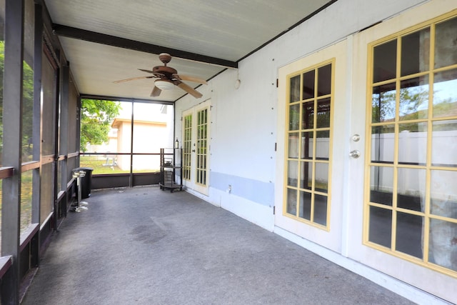 1356 N Climbing Rose, West Palm Beach, FL 33415 - unfurnished sunroom featuring french doors, a ceiling fan, and beamed ceiling