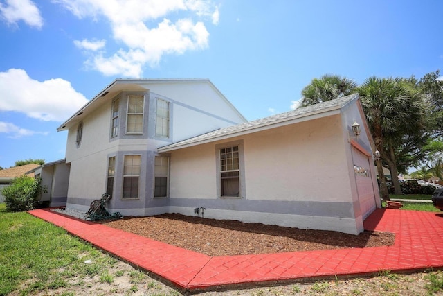 1356 N Climbing Rose, West Palm Beach, FL 33415 - view of side of property featuring stucco siding