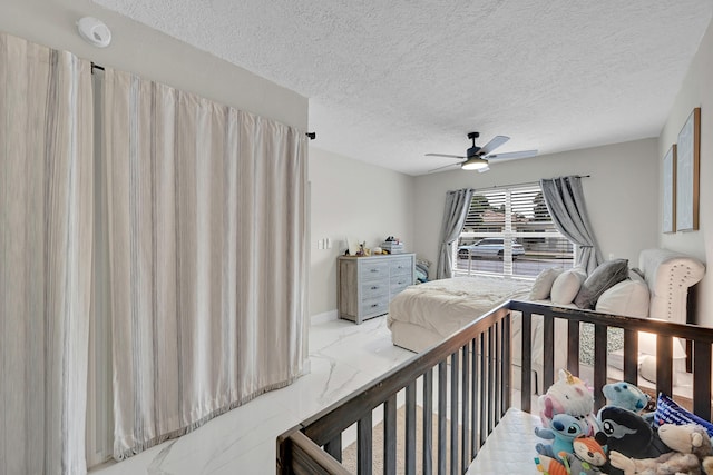 1331 S Palmway, Lake Worth Beach, FL 33460 - bedroom with a textured ceiling and a ceiling fan