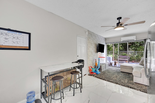 1331 S Palmway, Lake Worth Beach, FL 33460 - interior space featuring a wall unit AC, ceiling fan, a textured ceiling, and marble finish floors