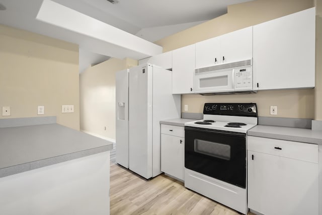 3048 SE Wake Rd, Port Saint Lucie, FL 34984 - kitchen with white appliances, light wood-style flooring, white cabinetry, and light countertops