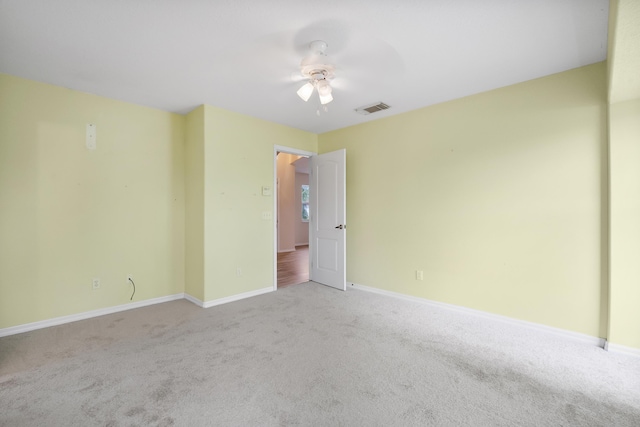 3048 SE Wake Rd, Port Saint Lucie, FL 34984 - empty room with carpet, ceiling fan, and baseboards