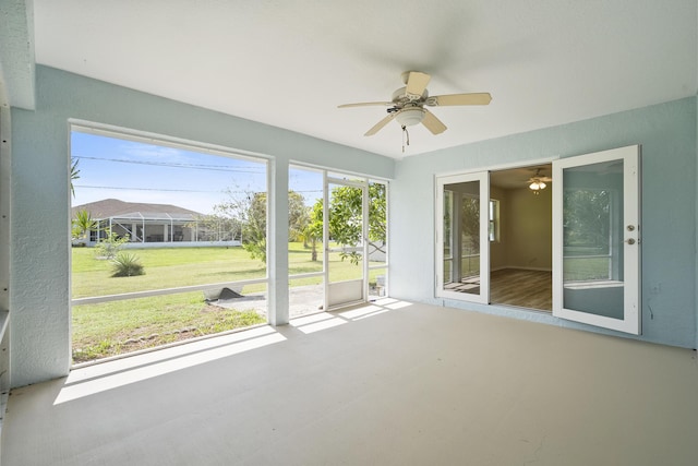 3048 SE Wake Rd, Port Saint Lucie, FL 34984 - unfurnished sunroom featuring a ceiling fan