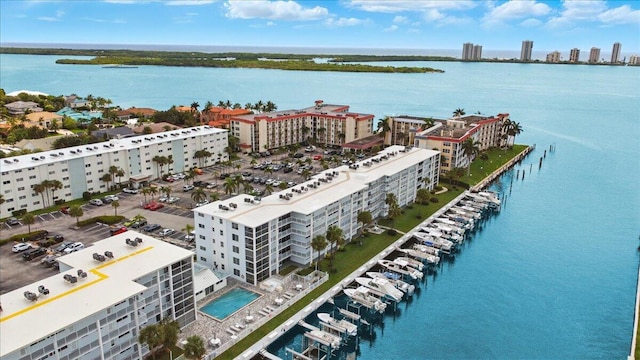104 Paradise Harbour Blvd Unit 104, North Palm Beach, FL 33408 - view of urban area with a nearby body of water, apartment complex, and a pool area