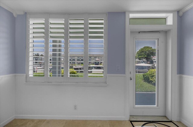 104 Paradise Harbour Blvd Unit 104, North Palm Beach, FL 33408 - entryway with a wainscoted wall
