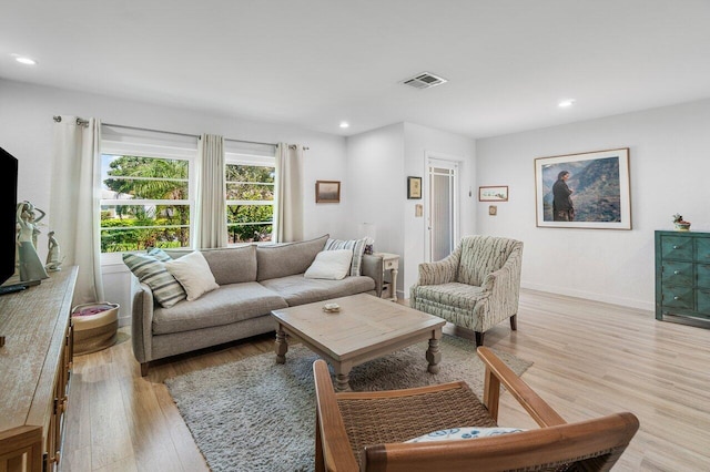 1222 N Palmway, Lake Worth Beach, FL 33460 - living area with light wood-type flooring, recessed lighting, and baseboards
