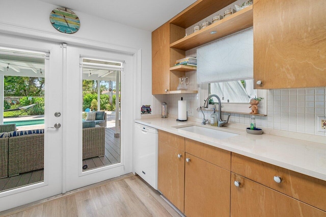 1222 N Palmway, Lake Worth Beach, FL 33460 - kitchen featuring dishwasher, open shelves, a sink, french doors, and decorative backsplash