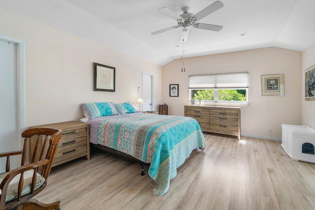 1222 N Palmway, Lake Worth Beach, FL 33460 - bedroom with lofted ceiling, wood finished floors, baseboards, and a ceiling fan