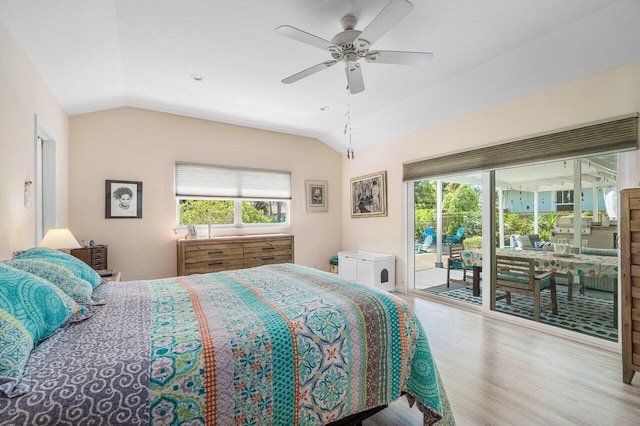 1222 N Palmway, Lake Worth Beach, FL 33460 - bedroom featuring access to exterior, vaulted ceiling, wood finished floors, multiple windows, and ceiling fan