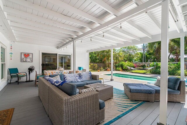 1222 N Palmway, Lake Worth Beach, FL 33460 - deck with outdoor lounge area and a fenced backyard