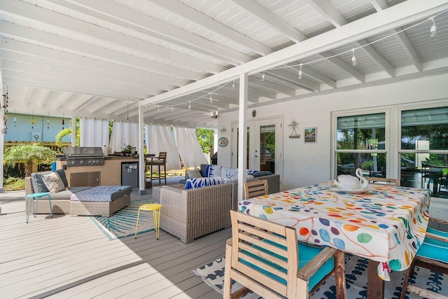 1222 N Palmway, Lake Worth Beach, FL 33460 - wooden deck featuring an outdoor living space and outdoor dining space