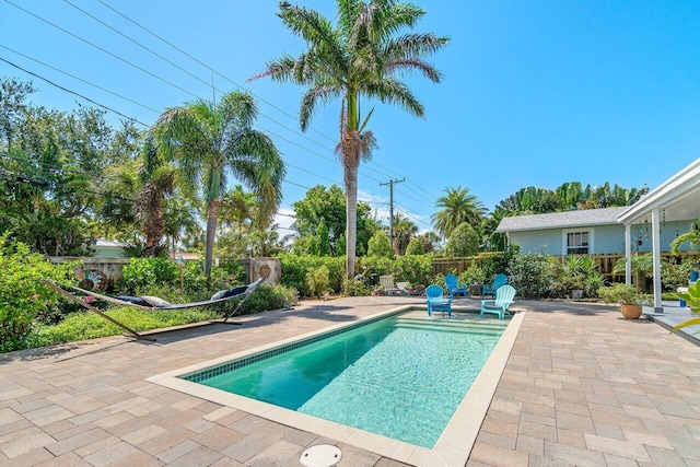 1222 N Palmway, Lake Worth Beach, FL 33460 - view of pool featuring a patio and a fenced backyard