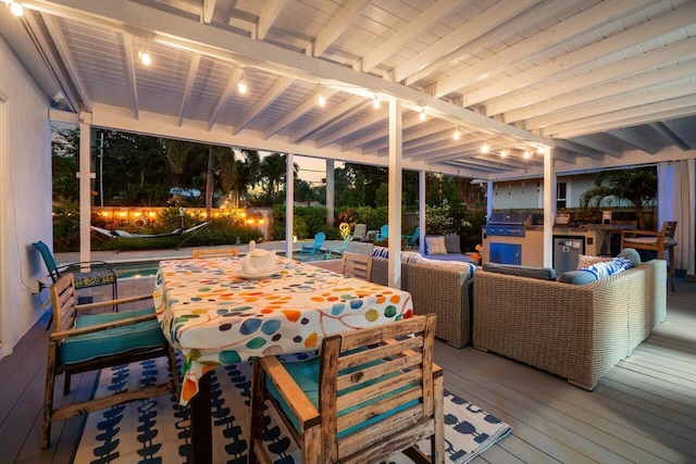 1222 N Palmway, Lake Worth Beach, FL 33460 - view of patio with outdoor dining space, exterior kitchen, a deck, and an outdoor pool