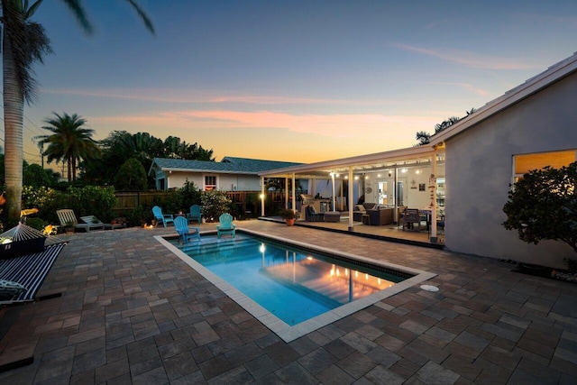 1222 N Palmway, Lake Worth Beach, FL 33460 - view of swimming pool with an outdoor hangout area and a patio area