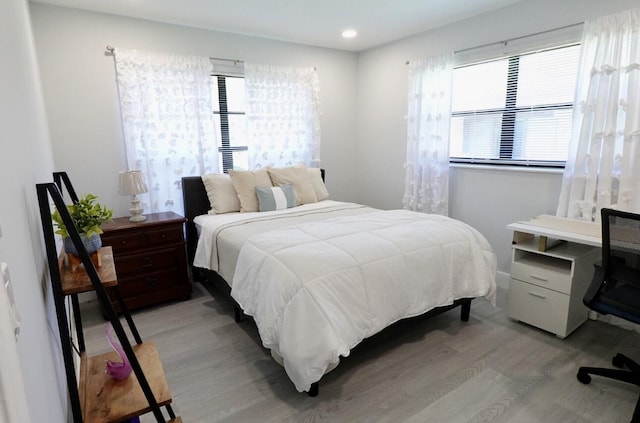 9740 Pecan Tree Dr Unit A, Boynton Beach, FL 33436 - bedroom with light wood-style floors, multiple windows, and recessed lighting