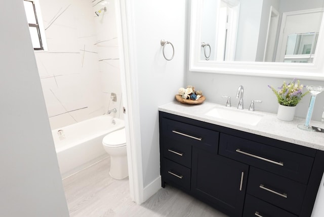 9740 Pecan Tree Dr Unit A, Boynton Beach, FL 33436 - full bath featuring vanity, toilet, shower / bathtub combination, and wood finished floors