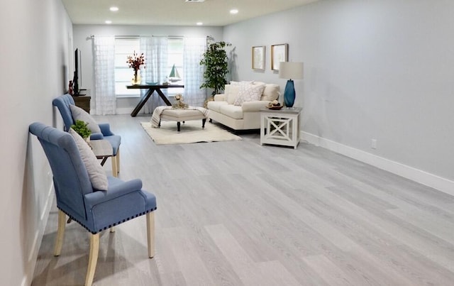 9740 Pecan Tree Dr Unit A, Boynton Beach, FL 33436 - living area featuring light wood finished floors, baseboards, and recessed lighting