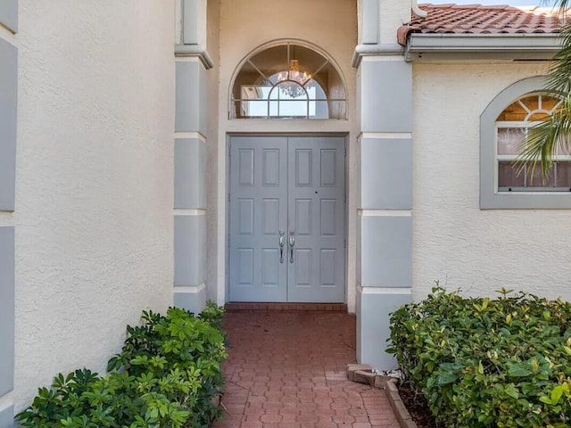 11353 Sea Grass Cir, Boca Raton, FL 33498 - entrance to property featuring stucco siding and a tiled roof