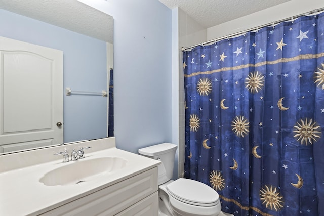 2683 SW Marquis Ter, Stuart, FL 34997 - bathroom with a textured ceiling, vanity, and a shower with shower curtain