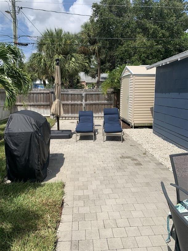 723 N Federal Hwy, Lake Worth Beach, FL 33460 - fenced backyard featuring a patio area and area for grilling
