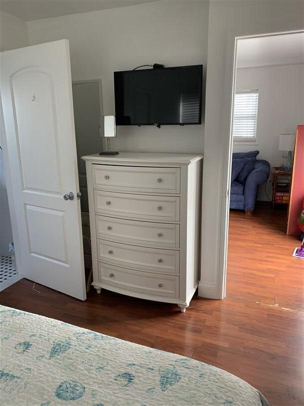 723 N Federal Hwy, Lake Worth Beach, FL 33460 - bedroom with dark wood-style floors