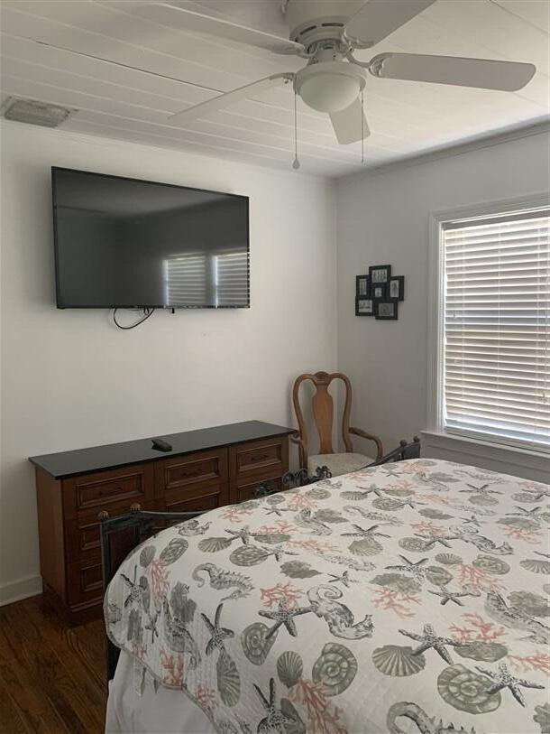 723 N Federal Hwy, Lake Worth Beach, FL 33460 - bedroom featuring dark wood-style flooring and ceiling fan