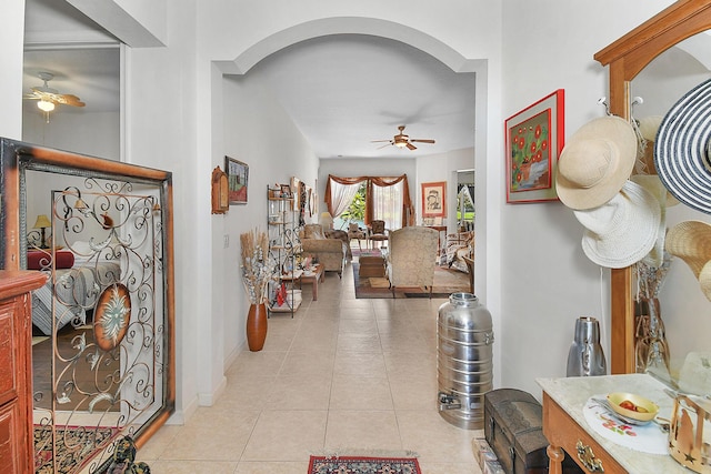 107 NW Summerville Ct, Port Saint Lucie, FL 34986 - corridor with light tile patterned floors and arched walkways