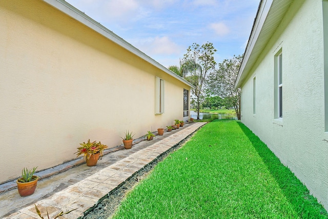 107 NW Summerville Ct, Port Saint Lucie, FL 34986 - view of green lawn